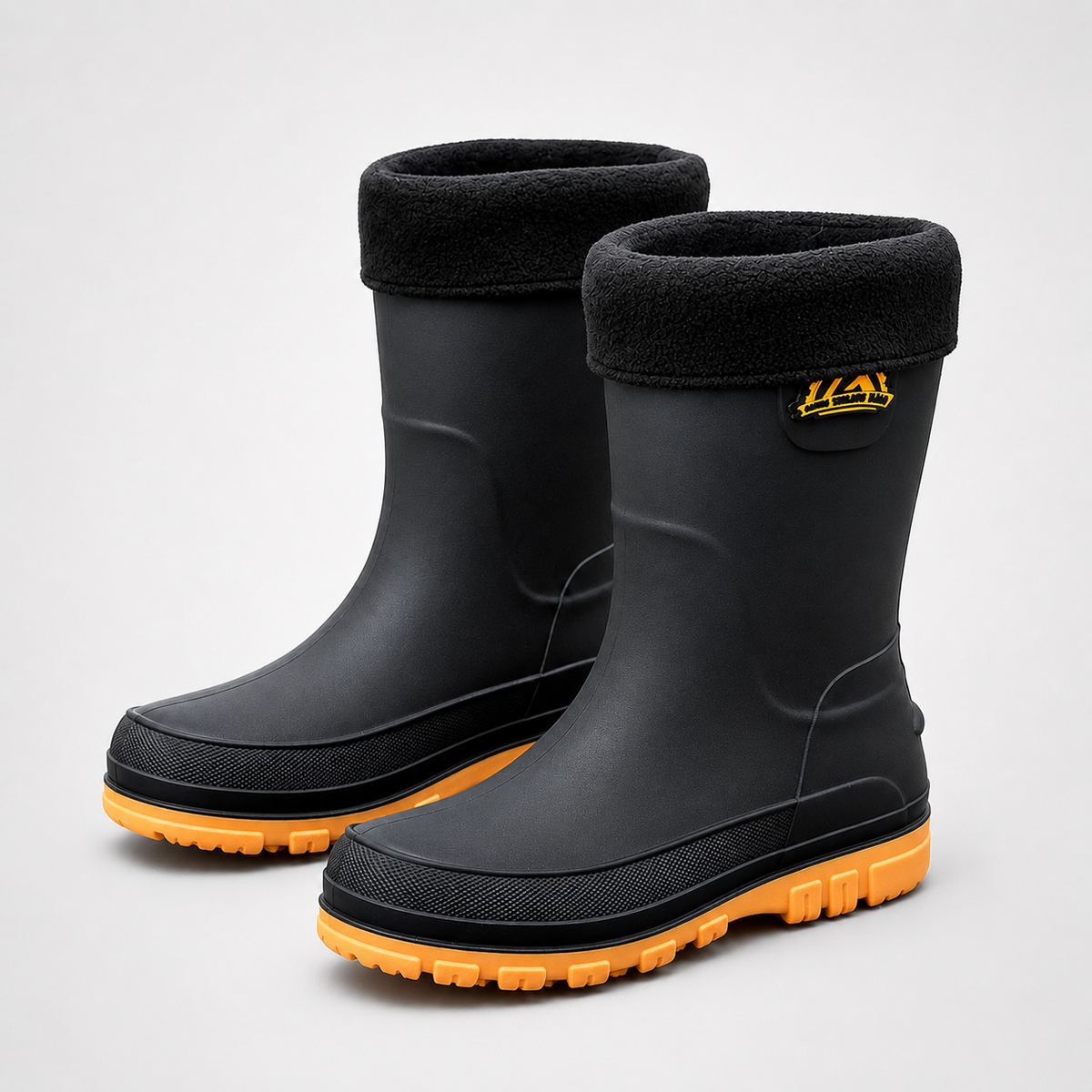 Insulated rain boots in Black with yellow sole