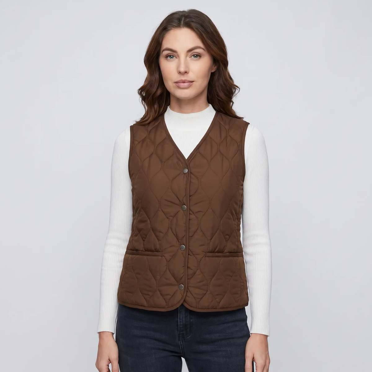 Women's quilted puffer vest in Brown, front view